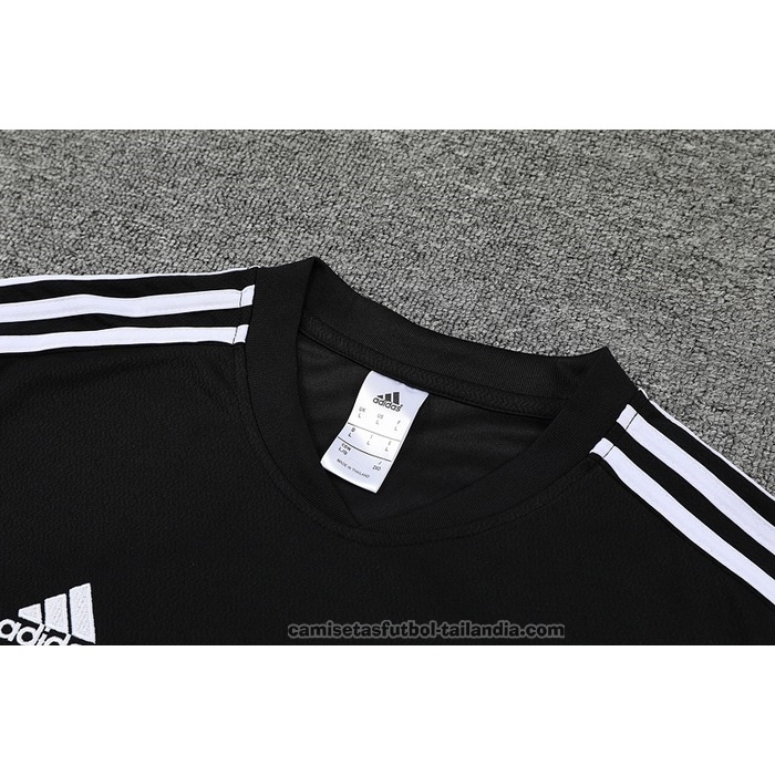 Chandal del Real Madrid Manga Corta 22/23 Negro y Purpura - Pantalon Corto